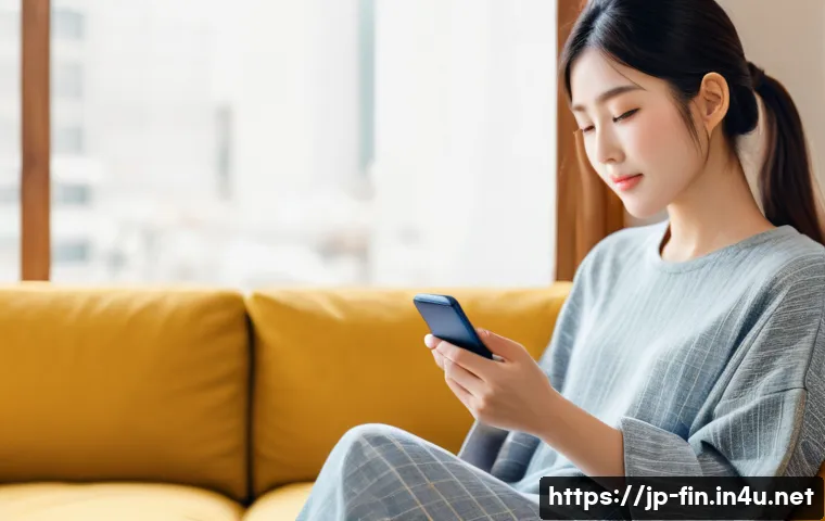 자유롭게 입출금 가능한 통장 - A modern Japanese woman using a smartphone banking app in a cozy, bright living room with natural li...